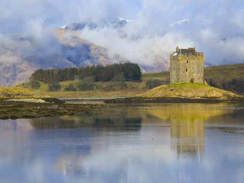 Castle Stalker reflected in the waters of Loch Laich