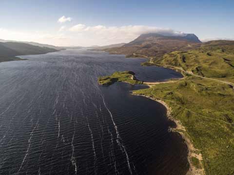 Looking down on Loch Assynt and Ardvreck Castle