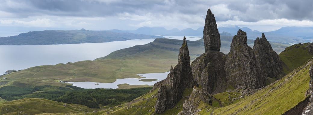 The Old Man of Storr on the Trotternish Peninsula overlooks Loch Leathan on the Isle of Skye