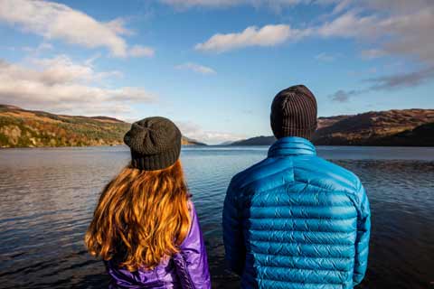 A couple looking out over Loch Ness
