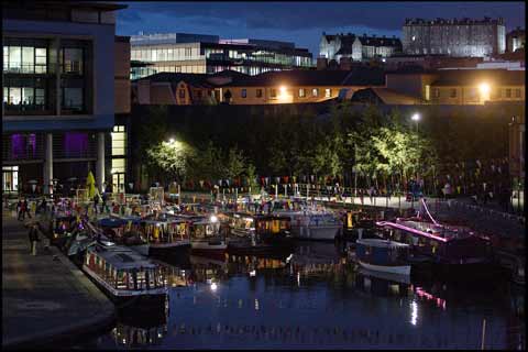 Dusk view of the canal boats moored at Edinburgh Quay 